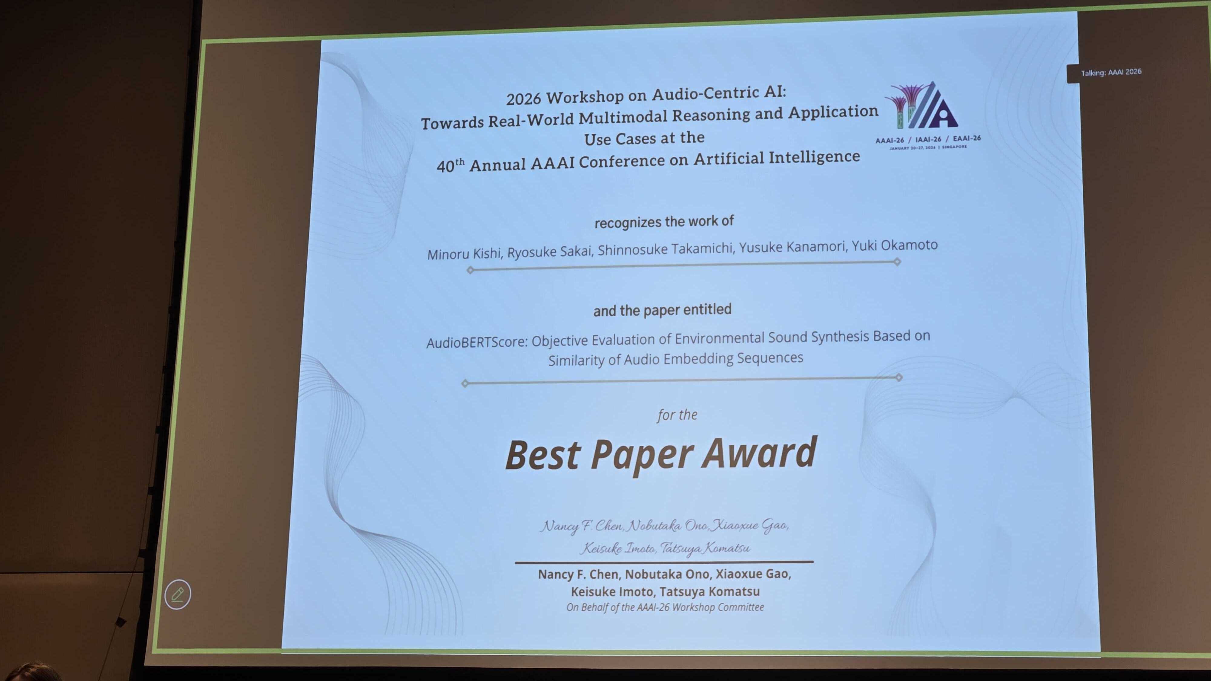 Award certificate slide for the Best Paper Award displayed on the screen at Audio-AAAI (AAAI-26)